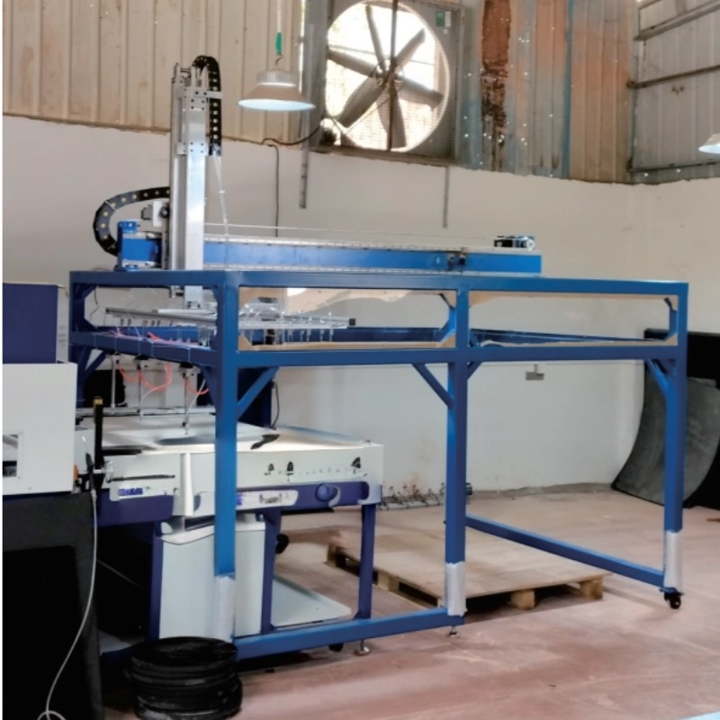 EVA material picking and waste disposal robotic arm